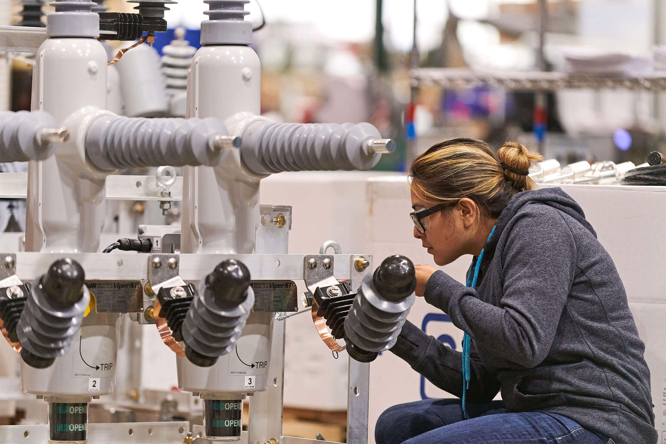 Woman working on a machine